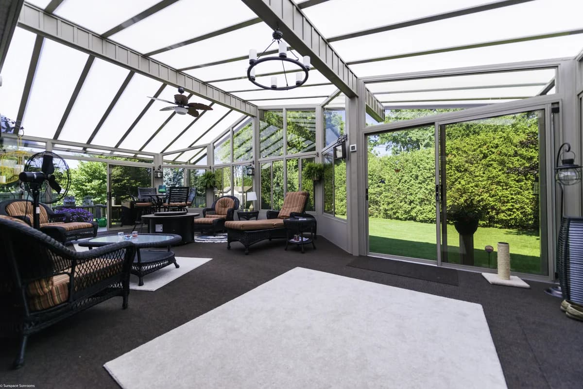 Three-season sunroom corner detail with WeatherMaster™-style glazing